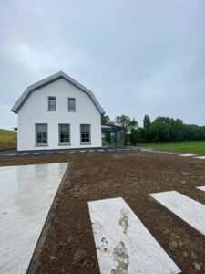 Het witte huis aan de dijk