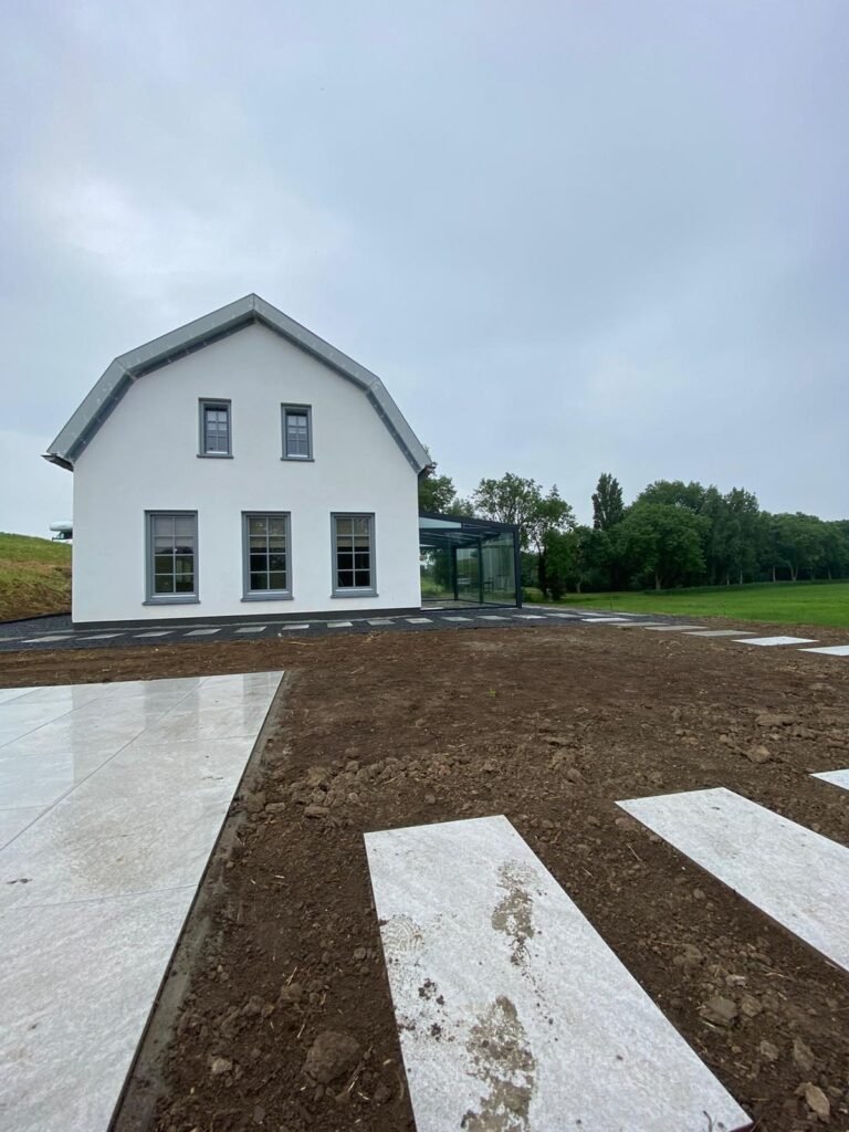 Het witte huis aan de dijk